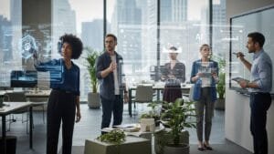 Diverse professionals collaborating with AI technology in modern office workspace showing digital interfaces and productivity tools